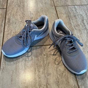 Women’s grey Nike running shoes